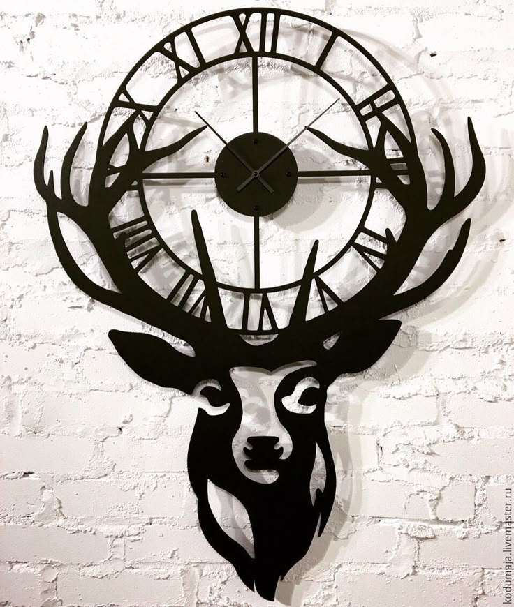 ساعت دیواری فلزی طرح گوزن